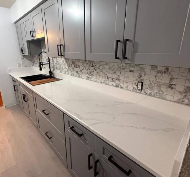 Gray cabinets with marble tile backsplash kitchen remodel - UST Kitchen & Bath project